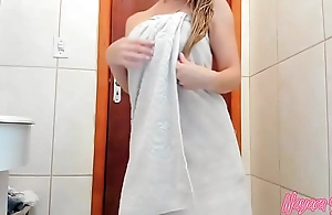 Leaving the bath beside just a towel, blinking coupled beside applying multitude cream