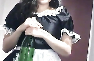 Oriental teen copulates her twat with a Asti spumante bottle