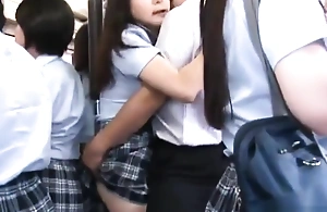 Oriental Schoolgirl gets drilled on a bus